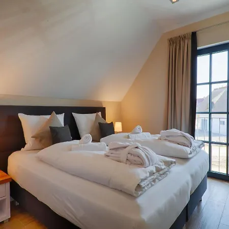 度假居 Reetland Am - Luxus Reetdachvilla Mit 3 Schlafzimmern, Sauna Und Kamin F18